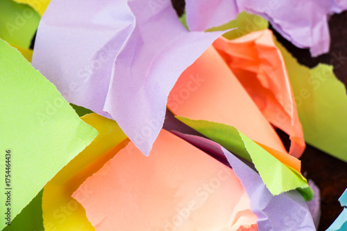 torn and colorful pieces of paper