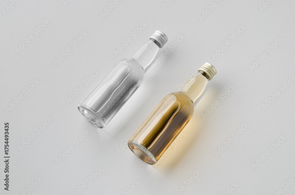 Naklejka premium Miniature spirits, liquor bottle mockup