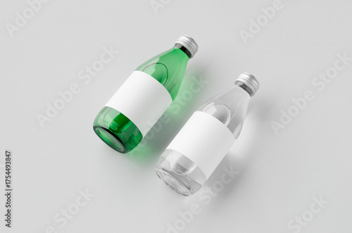 Water bottle mockup, green and clear glass, blank label