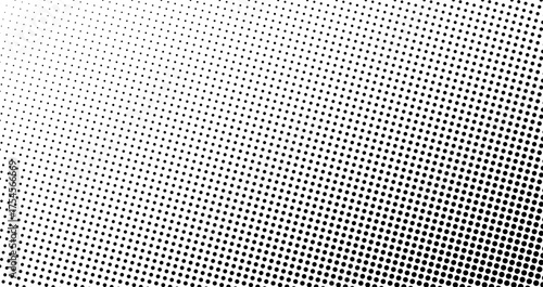 Simple vector halftone pattern with black dots on a white background. Classic pop art style with smooth gradient transition and retro feel.
