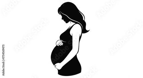 Silhouette of a pregnant woman holding her belly, symbolizing motherhood and anticipation.