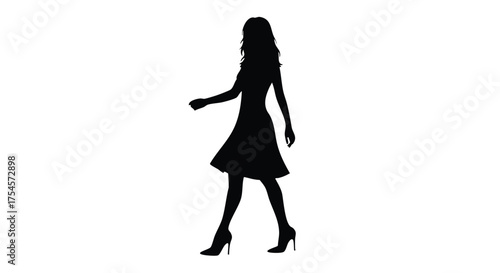 Silhouette of a woman walking gracefully, her dress flowing, captured in a striking black and white image, perfect for fashion and lifestyle themes