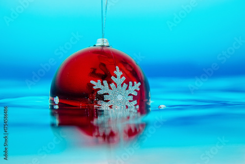 new year tree decoration in the water, christmas decoration in blue water