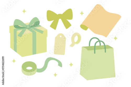 Assortment of essential gift wrapping items in soft pastel colors isolated on a white background