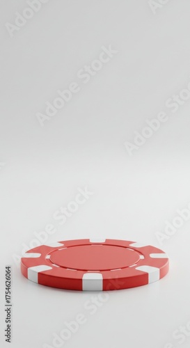 Single red poker chip, minimal background