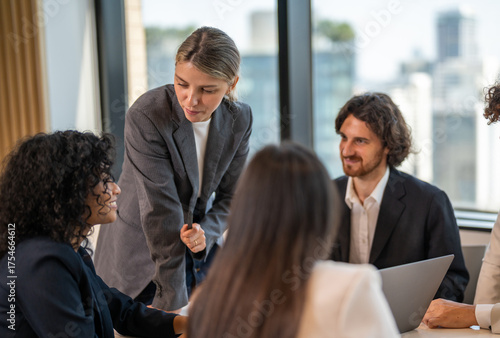 Leadership training, executive communication and team development in progress with diverse professionals in coaching seminar, strategic thinking and interpersonal skills in a modern workplace