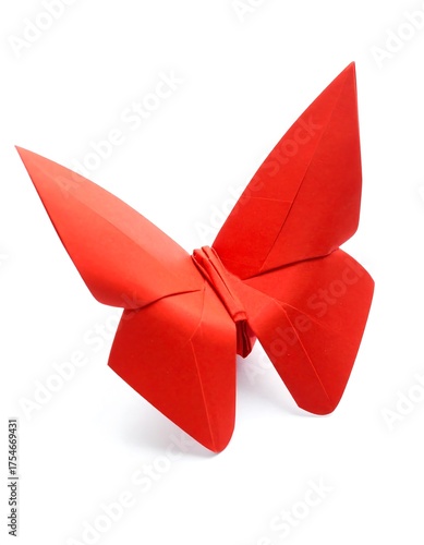 Bright red folded paper butterfly displayed isolated on a white background