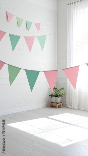 Bright room with bunting, a houseplant, and a window, bathed in sunlight. Minimalist space