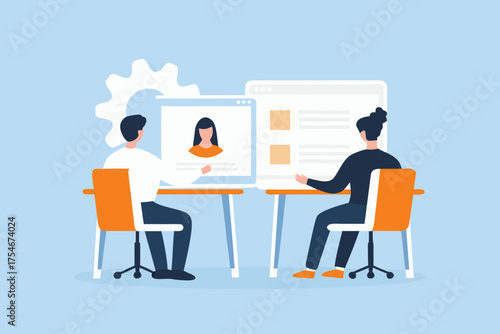 Two people collaborating at desks reviewing profiles and data on computer screens with a gear icon in the background