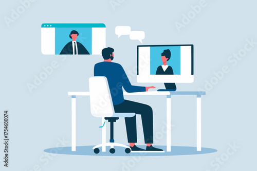 Man participating in a video conference call with colleagues from his home office