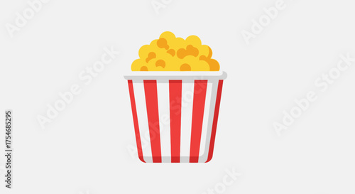 Delicious Popcorn in Striped Container Ready for Movie Night.