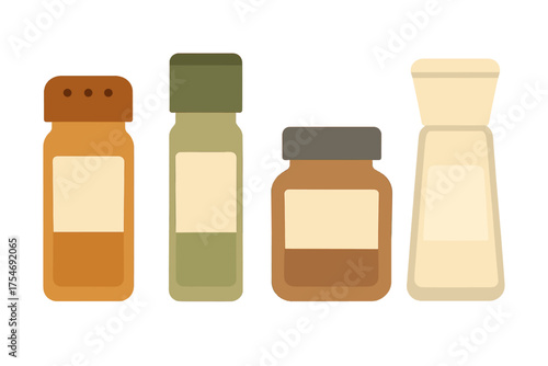 Assortment of kitchen spice shakers and seasoning jars with blank labels