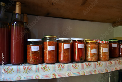 Winter preserves on a pantry shelf