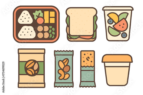 Isolated set of portable lunch and snack items including bento box and fruit cup