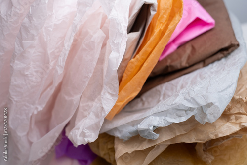 Wallpaper Mural Stack of colored tissue paper on a light background. Concept for decor, floristry, and packaging. Torontodigital.ca