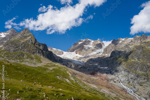 Wallpaper Mural This landscape photo was taken in Europe, France, Auvergne Rhone Alpes, Haute Savoie, in summer. It shows the Lee Blanche glacier and the Tre la Tete needles, under the sun. Torontodigital.ca