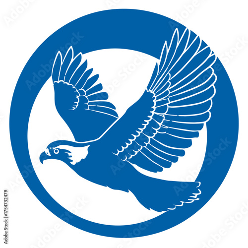 Majestic blue flying eagle silhouette in a circle. Powerful bird of prey graphic design for strength and freedom concept.