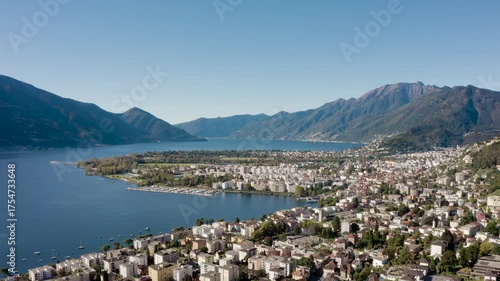 Panoramic view of Lake Maggiore, with Locarno in the foreground and Ascona in the background. An idyllic landscape for a holiday. 