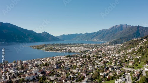 Panoramic view of Lake Maggiore, with Locarno in the foreground and Ascona in the background. An idyllic landscape for a holiday. 
