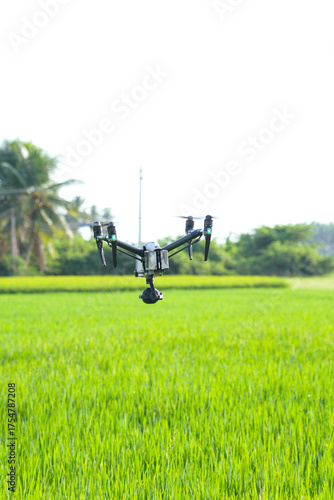 Professional cinema camera drone filming natural green agri feild