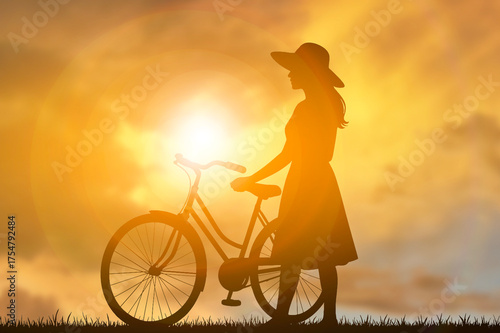 Silhouette of a Woman with Bicycle at Sunset, Peaceful Golden Evening