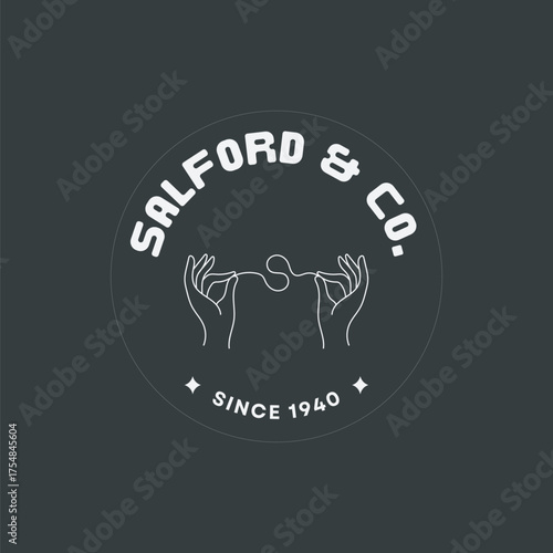Elegant vintage Salford & Co. logo with hands holding thread, symbolizing craftsmanship since 1940