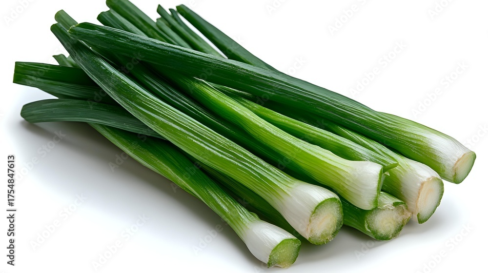 Obraz premium Fresh green onions with white bulbs and long stems isolated on white background, raw organic scallions for cooking and garnishing.