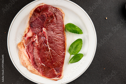 Duck breast raw poultry meat natural product tasty snack fresh delicious gourmet food background on the table rustic top view copy space