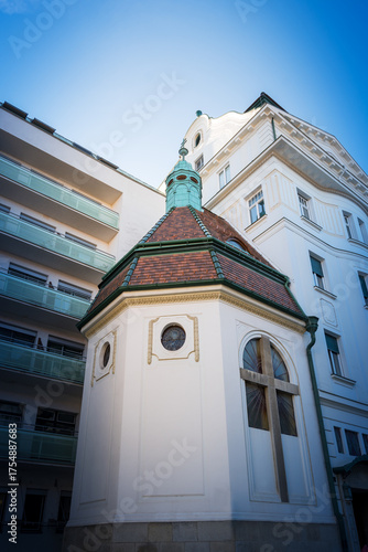 old chapel in the middle of the historic center of a small European town in sunny weather