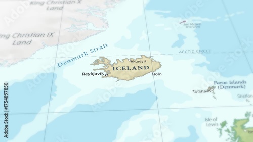 4K macro footage of Iceland on a world map with shallow depth of field. Focus on word Iceland and nearby regions. Travel geography footage