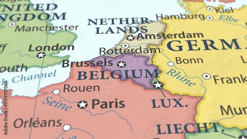 4K macro video of Belgium on a world map with shallow depth of field. Focus on word Belgium and surrounding areas including France, Netherlands, Germany, and Luxembourg. Travel geography footage