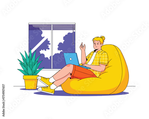 Young Man Working Remotely with Laptop in Comfortable Home Office