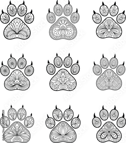 Intricate black and white decorative paw print designs in mandala style for various applications