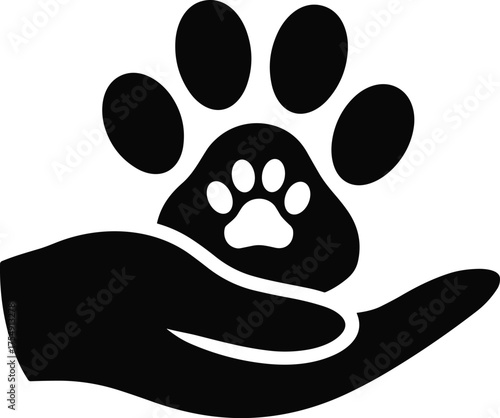 Paw print cradled in a hand representing animal care compassion and love.