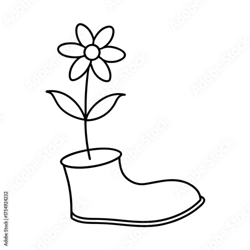 flower growing in a shoe pot 