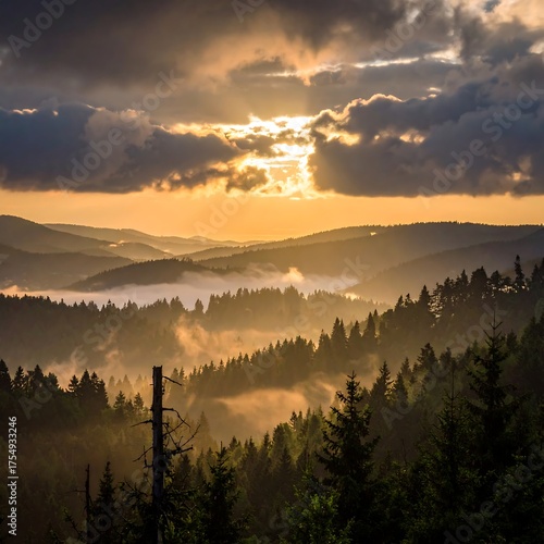 Mountain range scene under golden sunlight, shrouded in morning mist