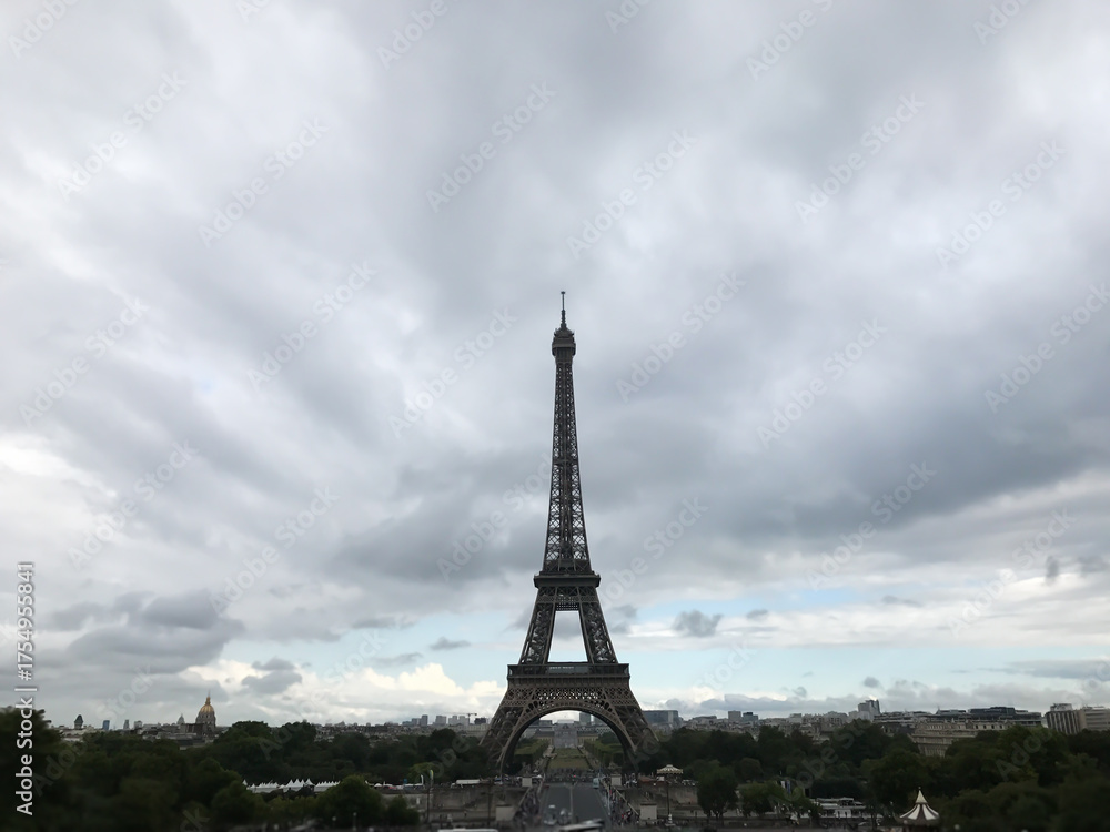 Naklejka premium The Eiffel Tower is lit up at day. Symbol of Paris and France. High quality