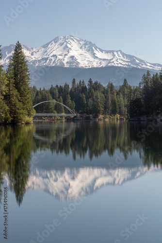Mount Shasta reflection with an arched bridge in the foreground