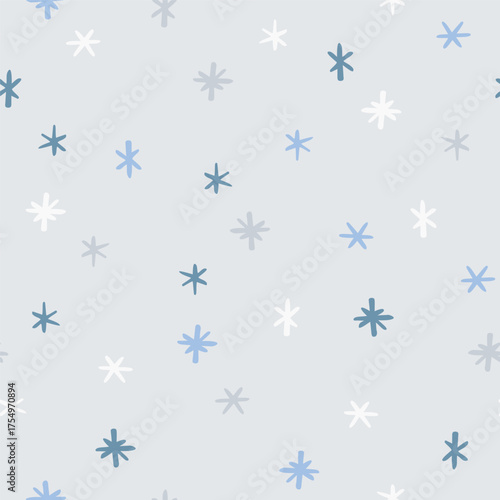 Vector seamless pattern with snowflakes. Cute hand drawn design for Christmas wrappings, textile, wallpaper and backgrounds.