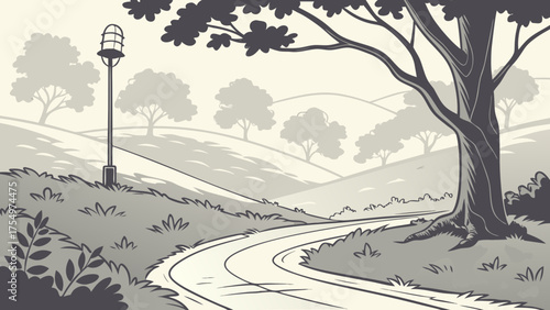 Green country road winding through a summer mountain landscape with trees and a clear blue sky.