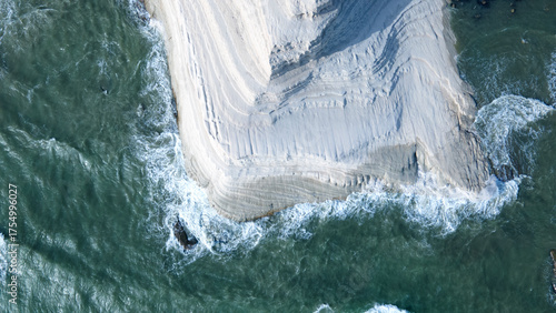 Aerial view of Scala dei Turchi, white limestone cliffs in Realmonte, Sicily, Italy, natural wonder and coastal attraction