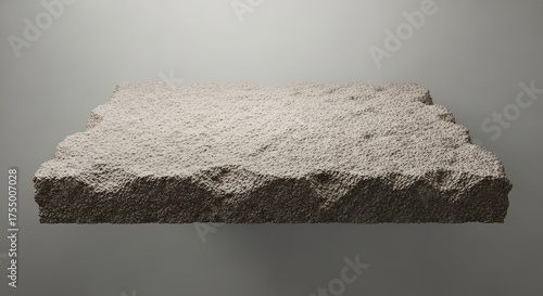 Concrete slab with rough texture on gray background