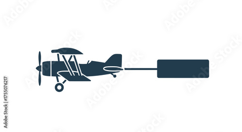 Vintage Biplane Towing a Rectangular Banner for Advertising.