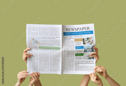 Female hands with newspaper...