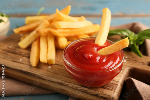Tasty french fries with bow...