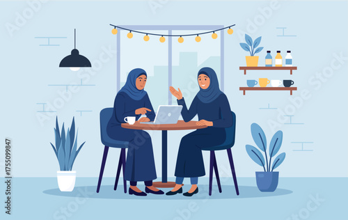 Muslim business meeting. Women in national costumes are discussing project in cafe. Startup presentation. Business consultation, deal talk. Arab friends working, studying together in co-working space