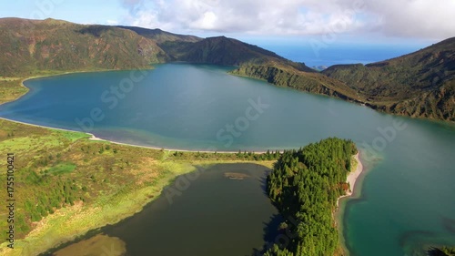Beautiful nature of Azores islands. Breathtaking turquoise volcanic lake Lago de Fuego (Lagoa do Fogo) aerial 4k hd drone video. Sao Miguel island, Portugal 