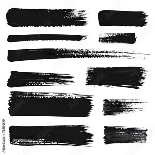 Collection of black paint strokes with varying textures and widths on a black background
