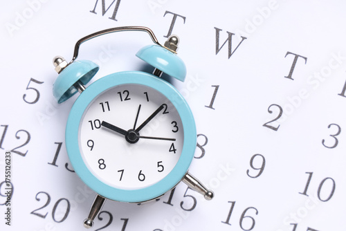 Light blue alarm clock on a...