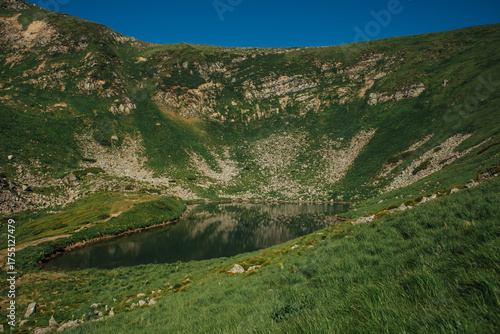 Landscape with mountain lake Brebeneskul. Green carpathian nature